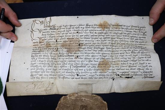 An Elizabeth I manuscript indenture in Latin relating to a grant of land in Norfolk, with wax seal,